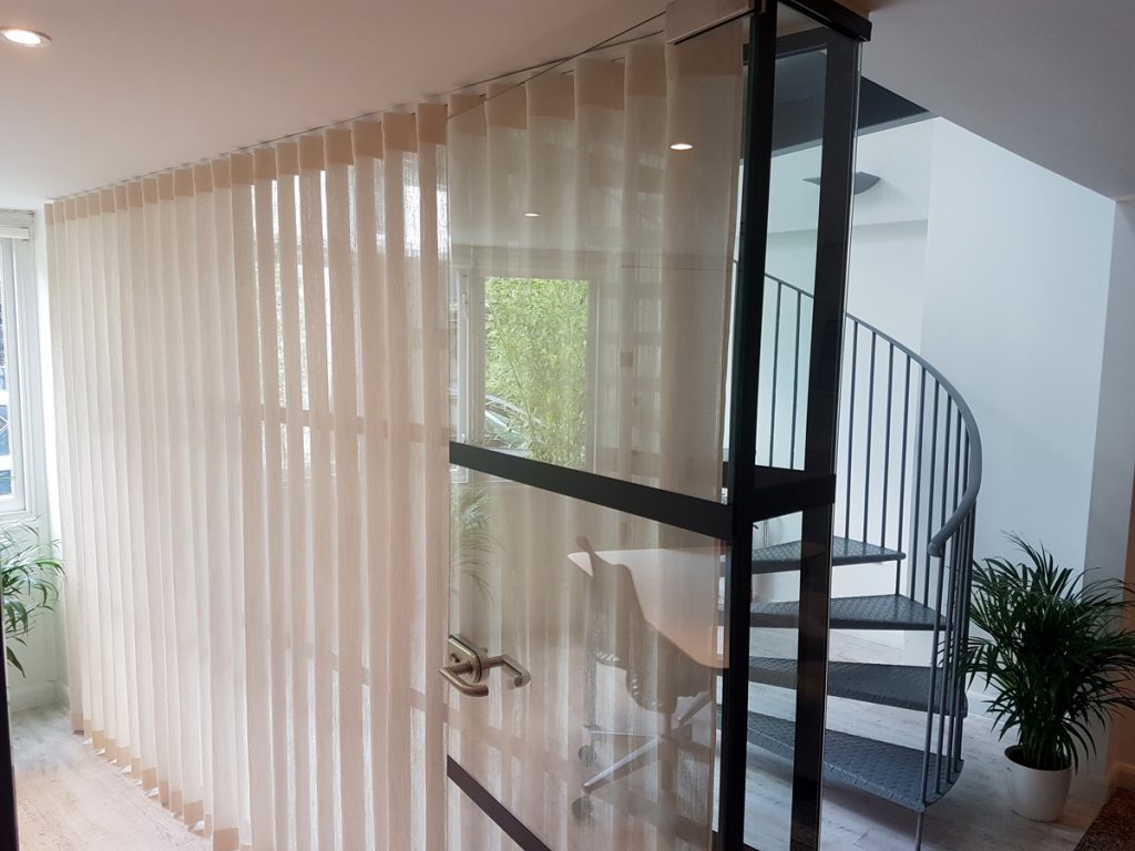 Curtain track and curtains in the office