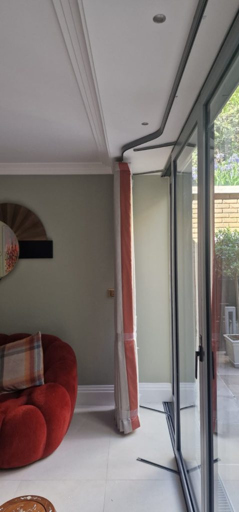 Wave curtains with leading edge border in Esher