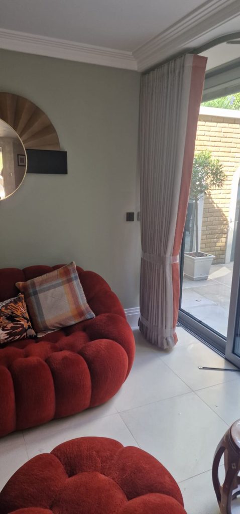 Wave curtains with leading edge border in Esher